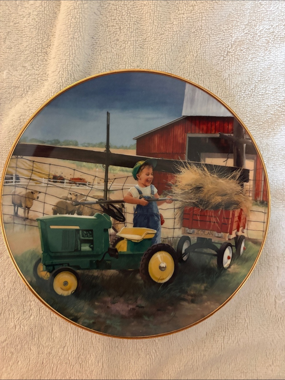 Danbury Mint Little farm hand series. Titled pitching in.
